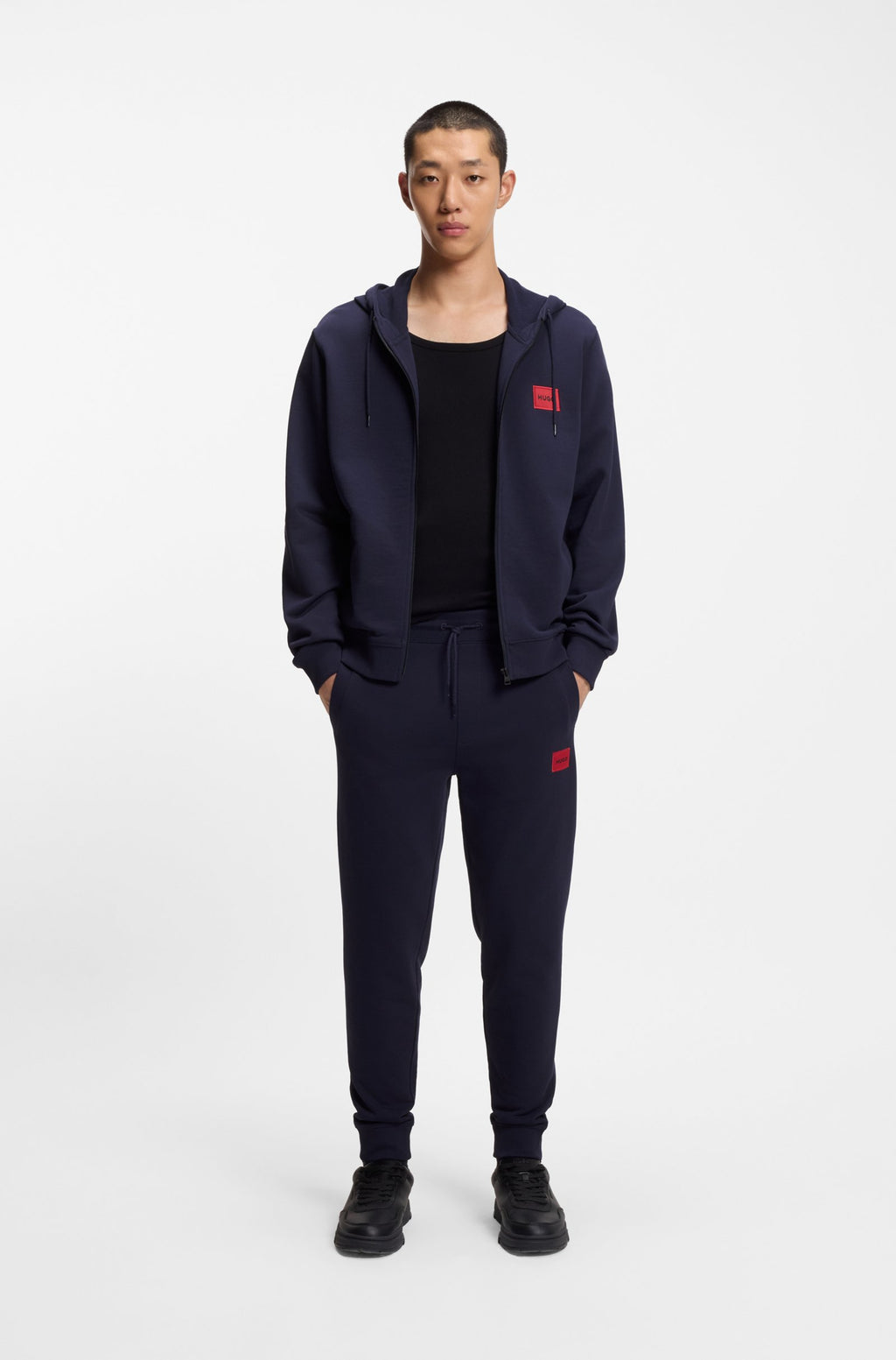 Prenda con capucha de felpa de algodón con cremallera y etiqueta con logo