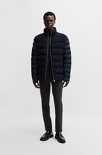 Chaqueta repelente al agua en mezcla de tejidos