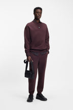 Sudadera de algodón con insignia de logo apilado