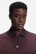 Sudadera de algodón con insignia de logo apilado