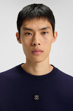 Sudadera de algodón con insignia de logo apilado