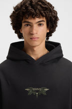 Sudadera con capucha en felpa de algodón con ilustración bordada