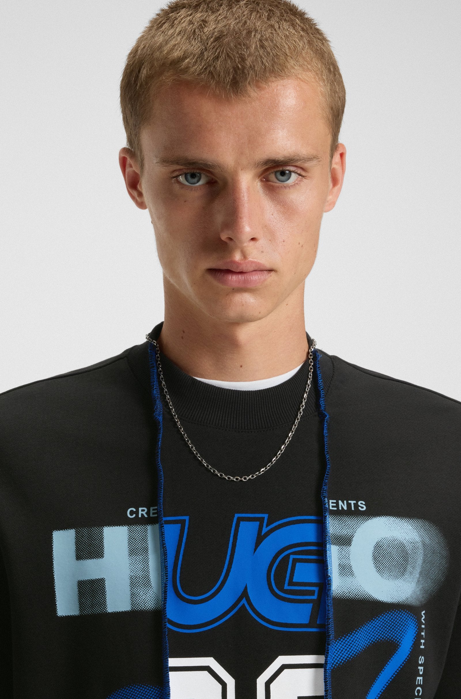 Sudadera de felpa de algodón con efecto a capas y mezcla de estampados