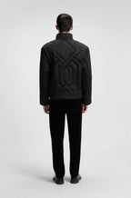 Chaqueta repelente al agua en satén guateado