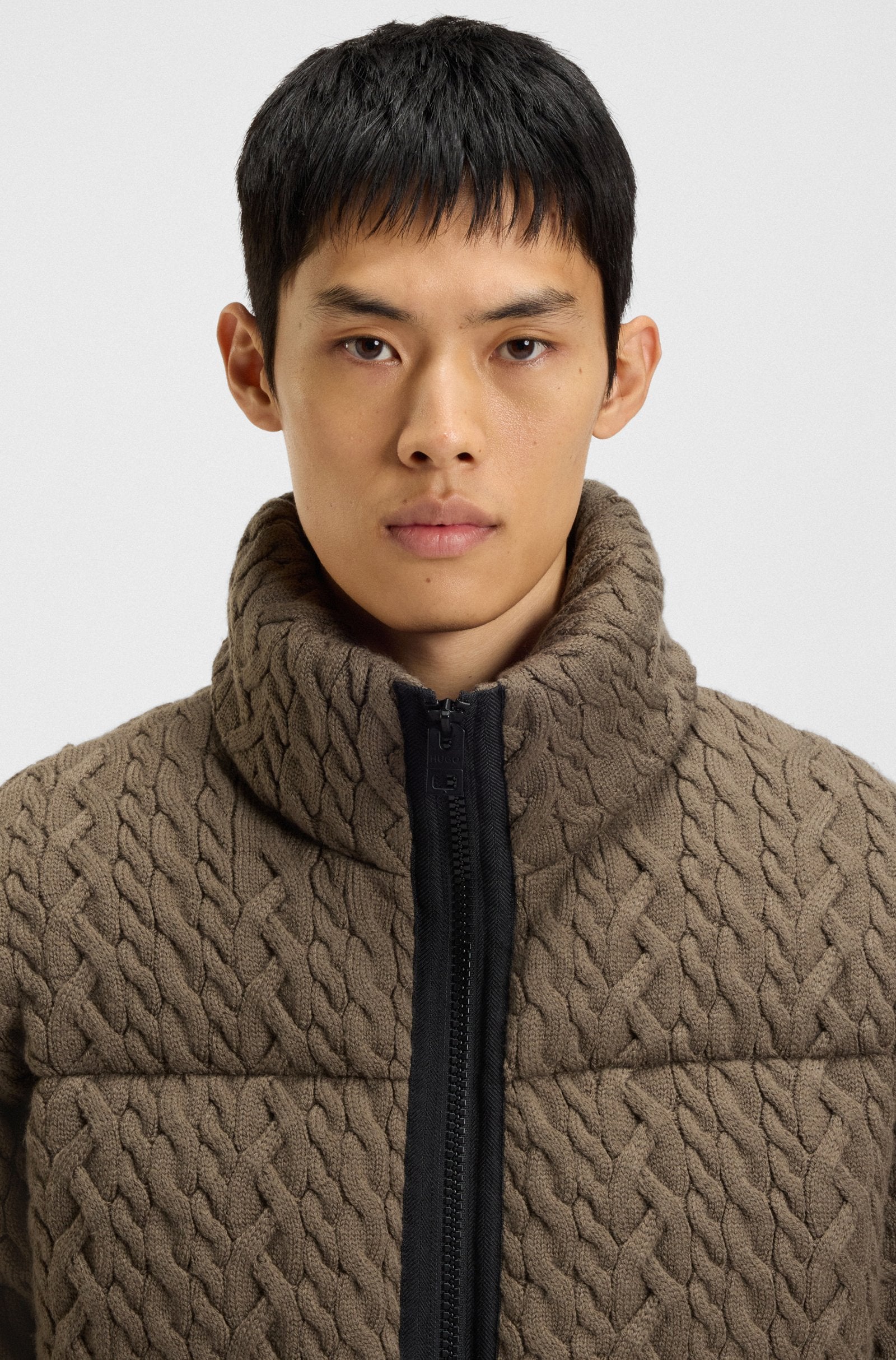 Chaqueta acolchada con estructura de punto trenzado