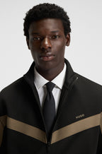 Sudadera relaxed fit con cremallera y cinta de chevrón