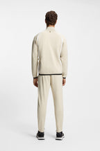 Sudadera con cremallera en tejido de gabardina elástico con propiedades termorreguladoras