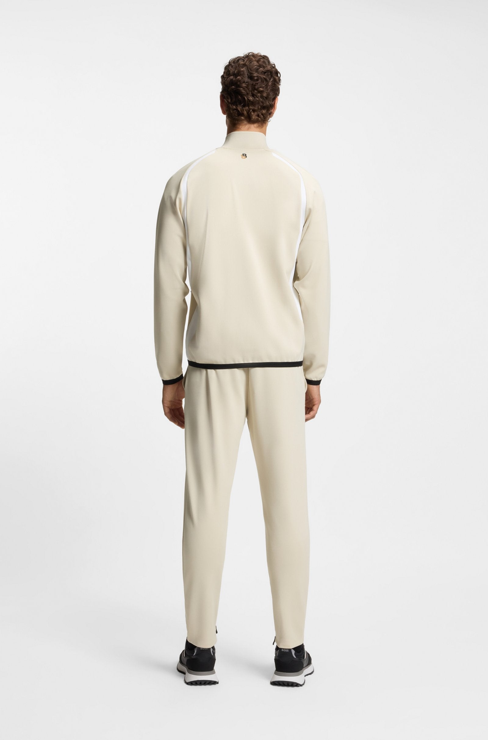 Sudadera con cremallera en tejido de gabardina elástico con propiedades termorreguladoras